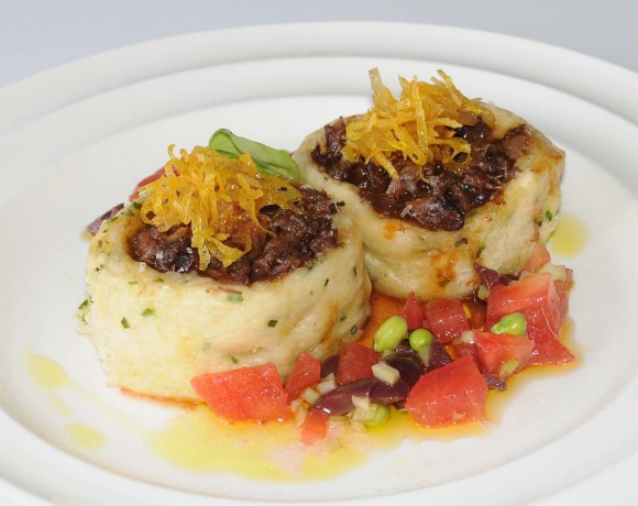 OXTAIL WRAPPED IN A HERB DUMPLING, SERVED WITH FRIED GLAZED GINGER AND LEMON CONFIT AND A WARM RUSSIAN SALAD